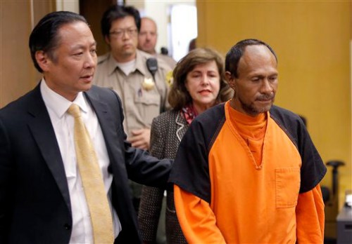 In this Tuesday, July 7, 2015 file photo, Juan Francisco Lopez-Sanchez, right, is lead into the courtroom by San Francisco Public Defender Jeff Adachi, left, and Assistant District Attorney Diana Garciaor, center, for his arraignment at the Hall of Justice in San Francisco. More than 1,800 immigrants that the federal government wanted to deport were nevertheless released from local jails and later re-arrested for various crimes, according to a government report released Monday, July 13, 2015. (Michael Macor/San Francisco Chronicle via AP, Pool, File)