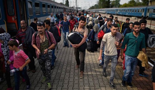 Migrants at a train station in Hegyeshalon, Hungary. (Jeff J. Mitchell/Getty)