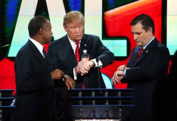 LAS VEGAS, NV - DECEMBER 15: (L to R) Republican presidential candidates Ben Carson, Donald Trump and U.S. Sen. Ted Cruz (R-TX) look at their watches during the CNN Republican presidential debate on December 15, 2015 in Las Vegas, Nevada. This is the last GOP debate of the year, with U.S. Sen. Ted Cruz (R-TX) gaining in the polls in Iowa and other early voting states and Donald Trump rising in national polls. (Photo by Justin Sullivan/Getty Images)